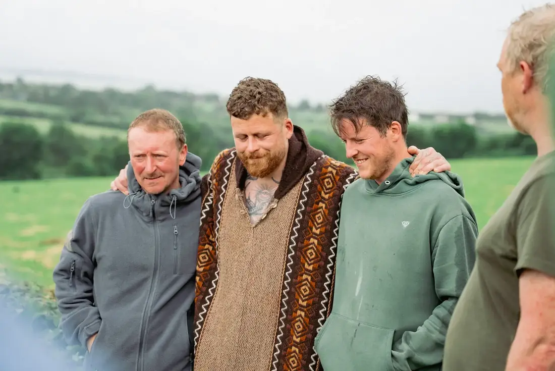 Men standing together after a gathering